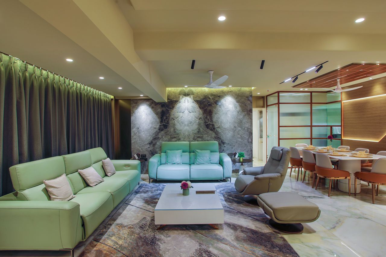 Elegant living and dining room with modern design, featuring luxury furniture and stylish decor.